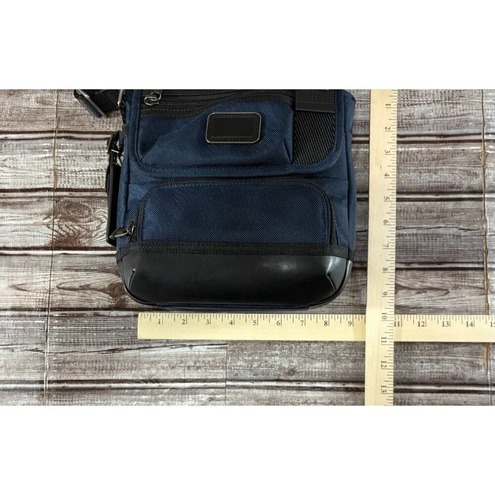 Tumi Fremont KERBY 9.5” Sling Crossbody Bag color NAVY BLUE NWT mspr $295